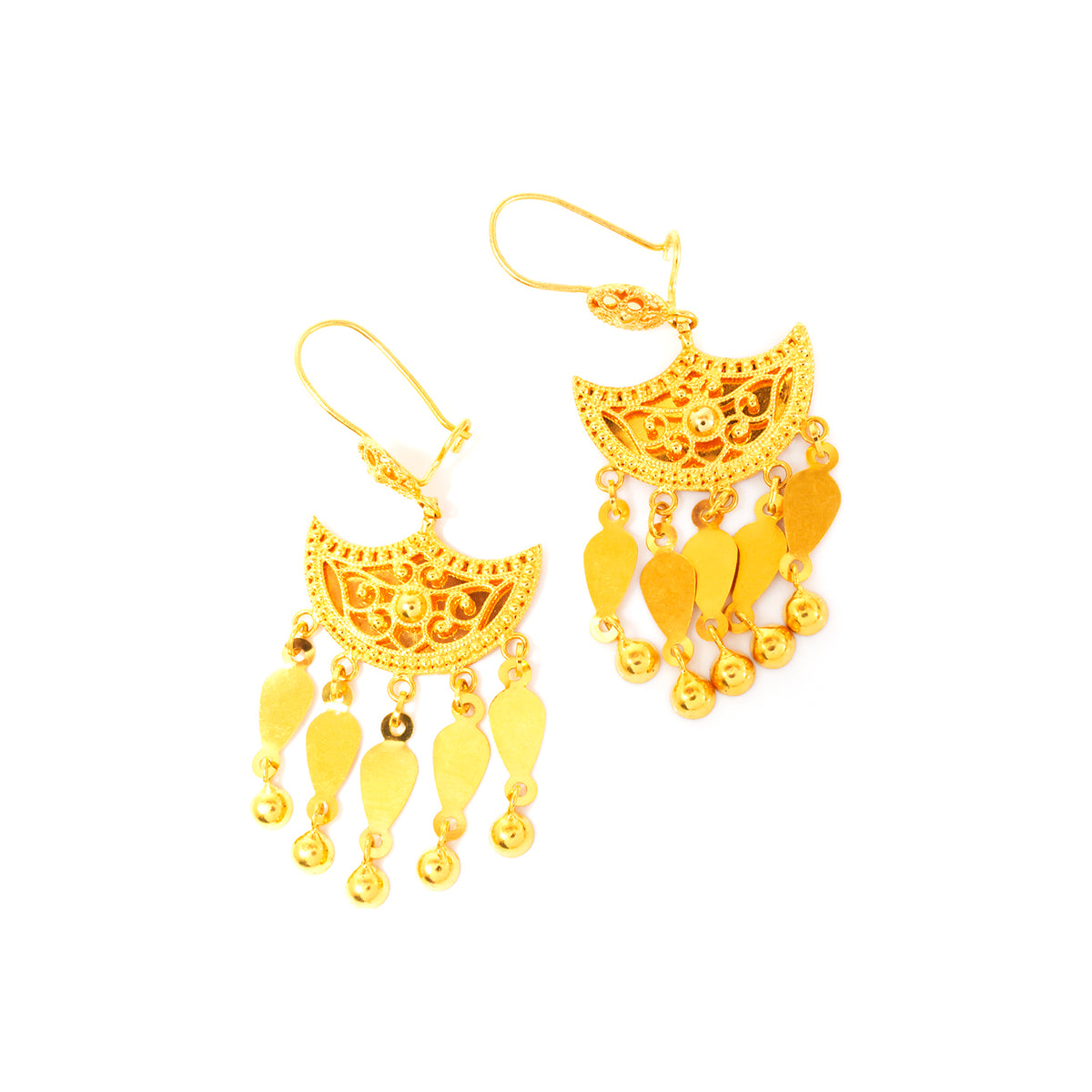 Gold earrings with intricate designs on a white background