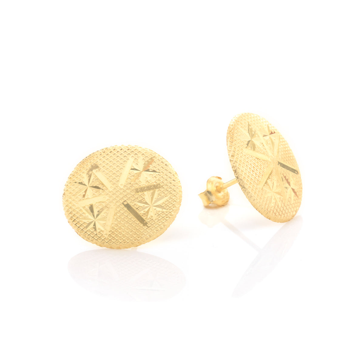 A pair of textured gold oval stud earrings with a starburst pattern, shown on a clean white background with soft reflections.