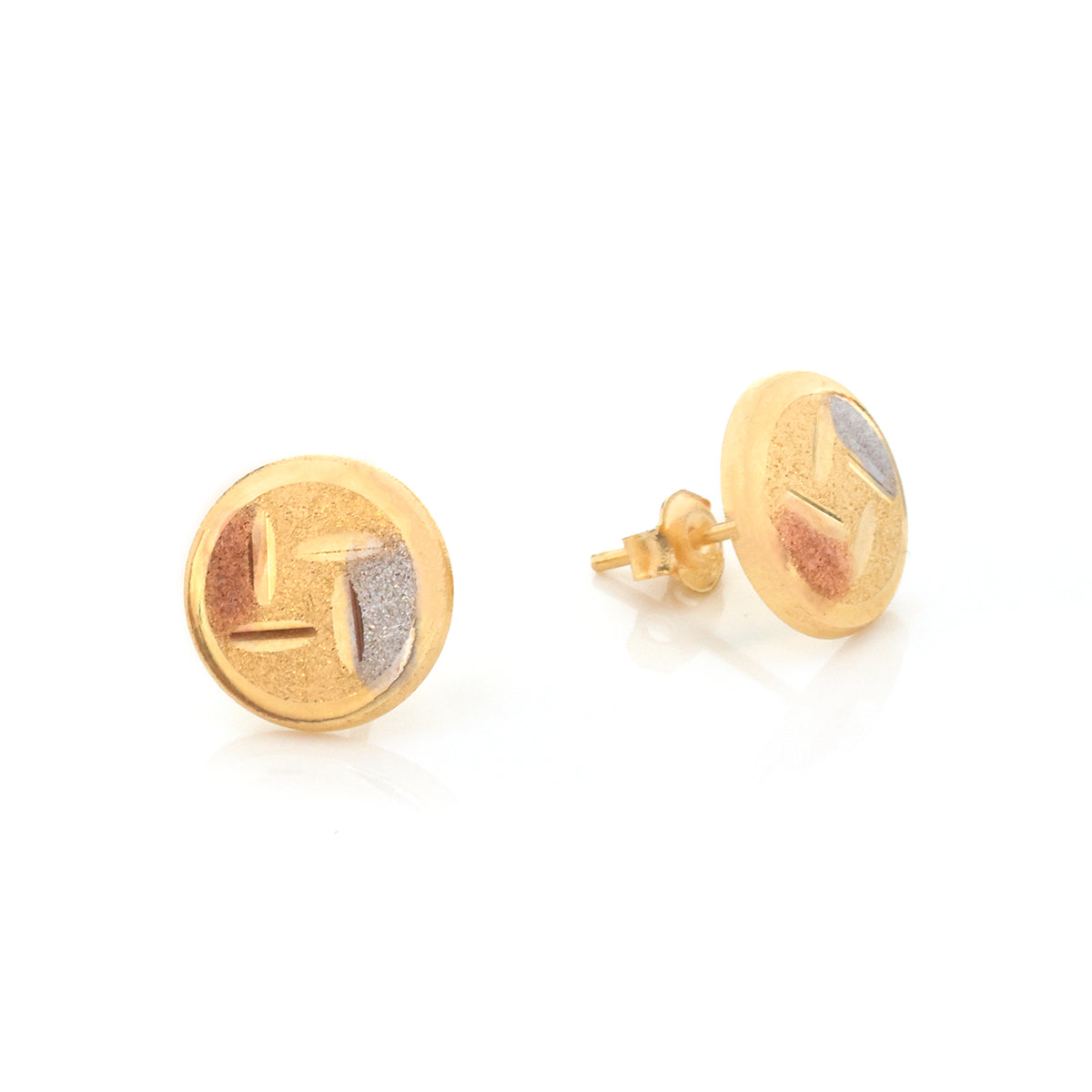 A pair of gold round stud earrings with a textured, hammered finish and a central recessed chevron design, shown on a clean white background.
