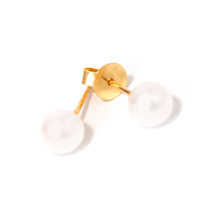 ذهب قرط مع white stone on white background