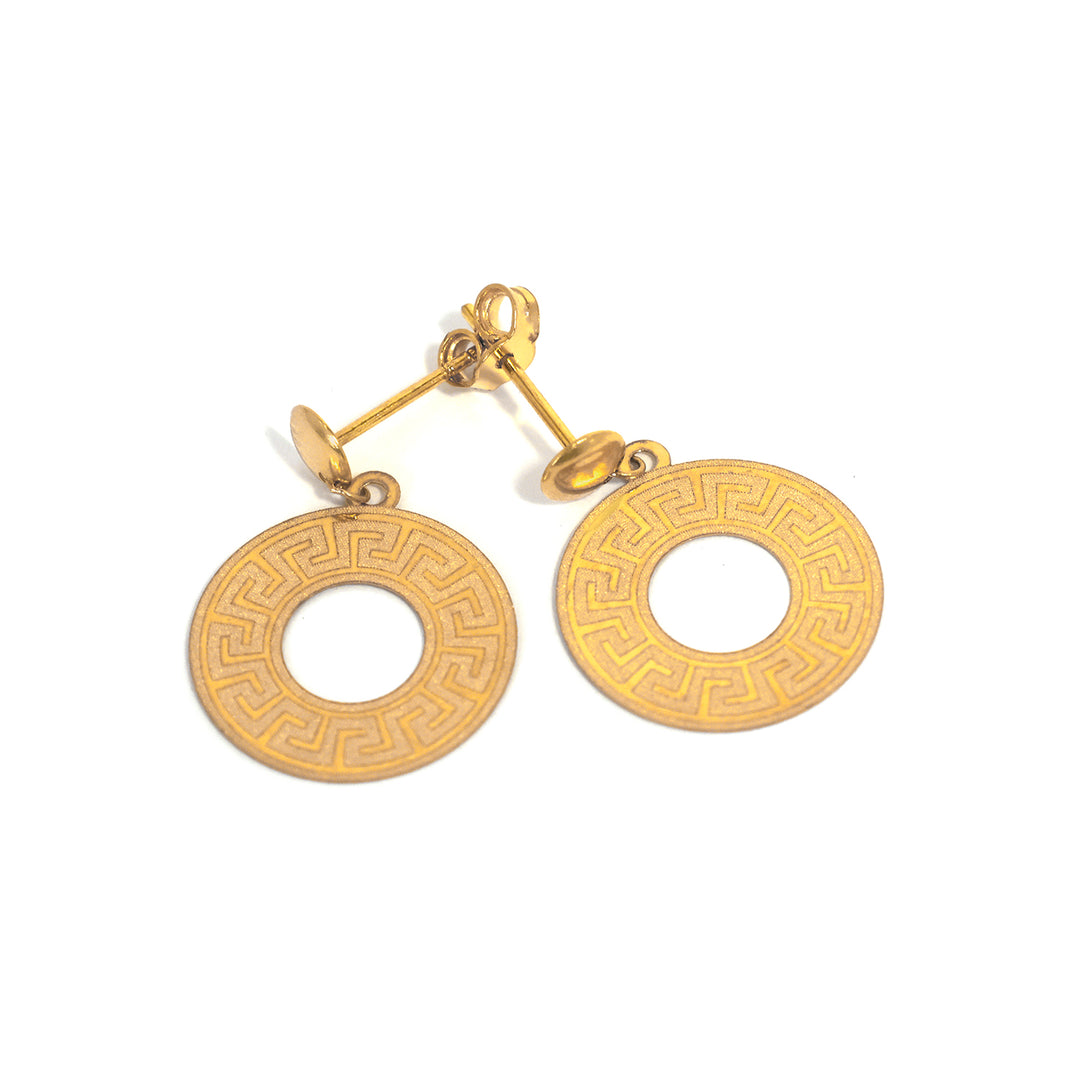 Gold circular earrings with intricate designs on a white background
