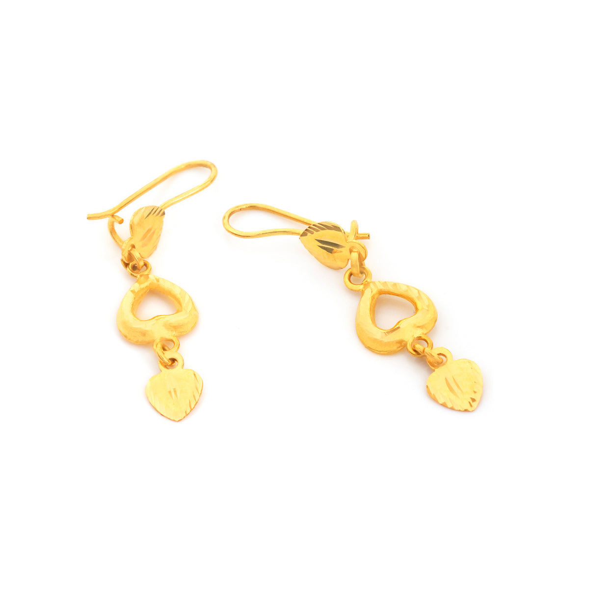 A pair of gold dangle earrings with a textured leaf charm, photographed on a solid white background.