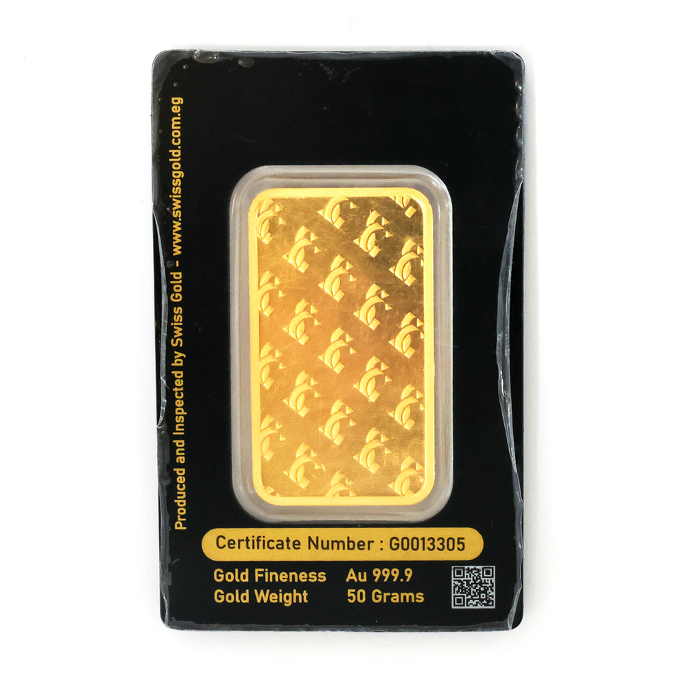 Gold bar in packaging with Swiss Gold logo and certification details on a white background