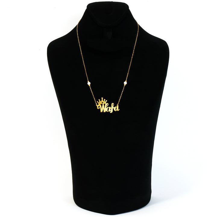 Gold necklace with 'Rhadeezi' pendant on a black mannequin bust.