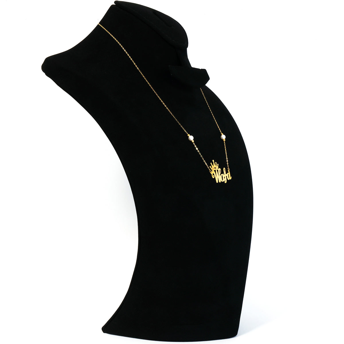 Black turtleneck sweater with a gold necklace on a white background