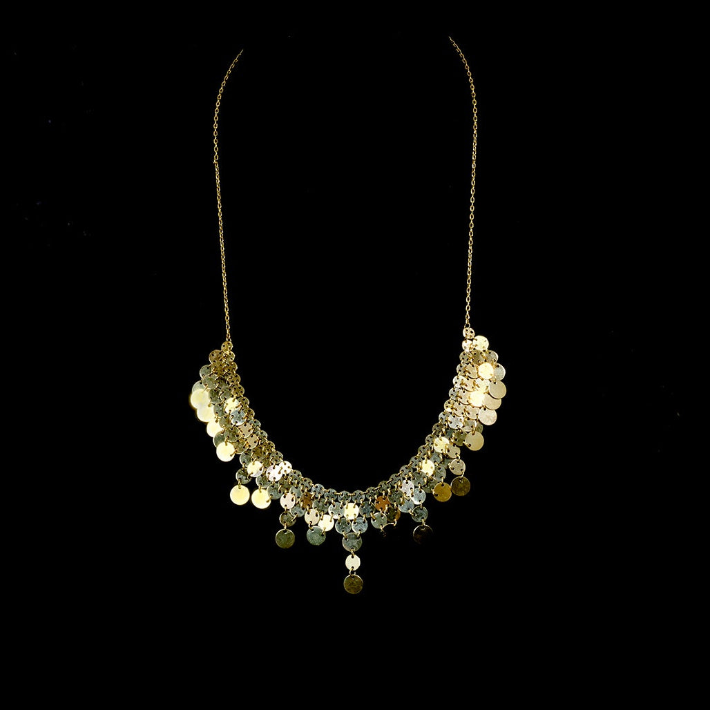 Necklace with circular pendants on a black background
