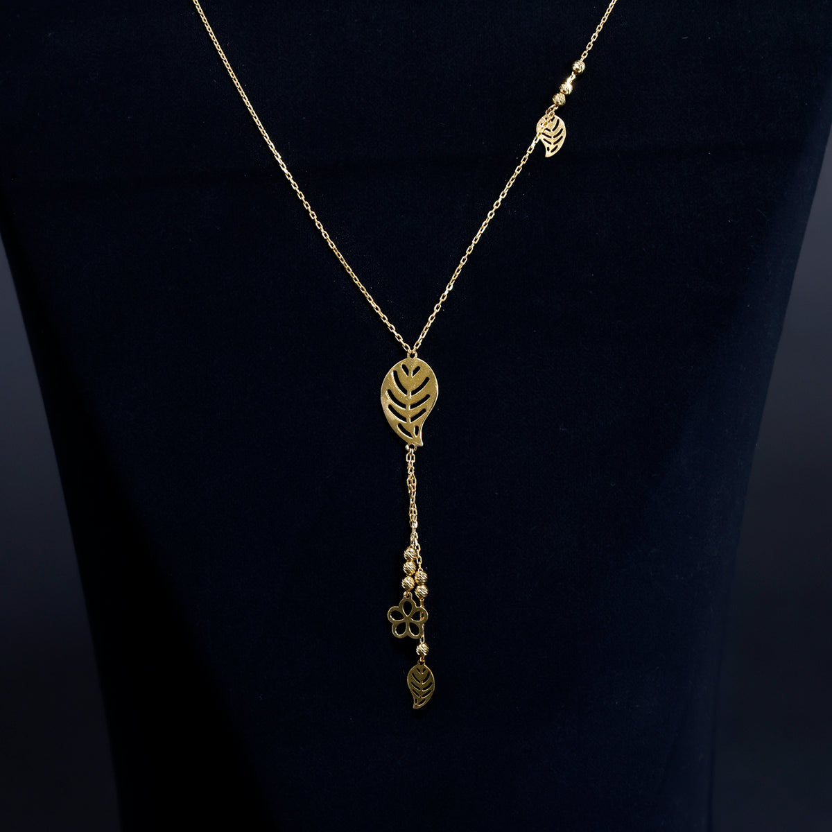 21K Gold Necklace – Lariat-style necklace with leaf cutout motif - Close View