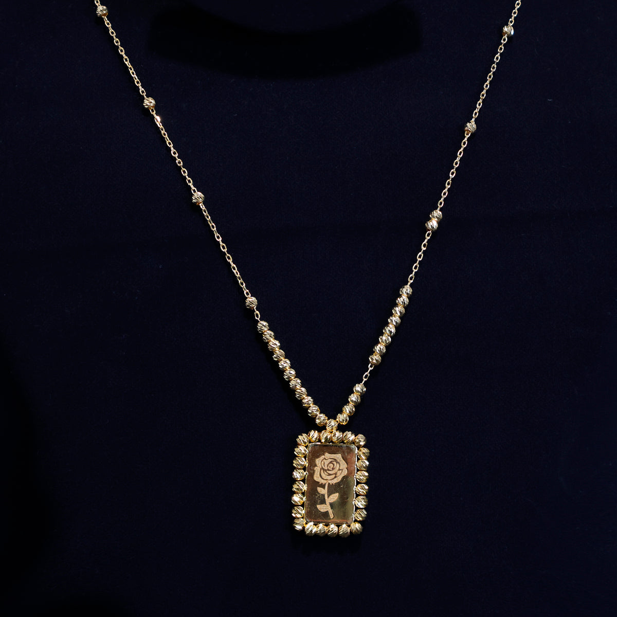 21K Gold Necklace – Rectangular pendant engraved with a rose design - Close View