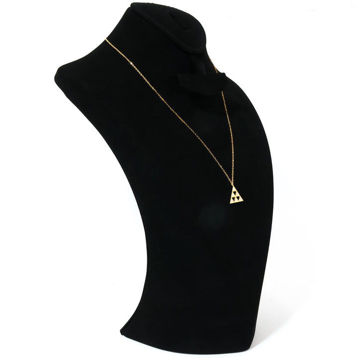 Pearl necklace on a black mannequin bust against a white background