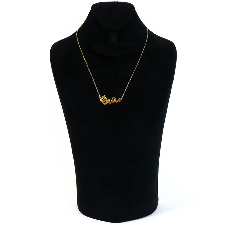 Gold necklace on a black mannequin with a white background