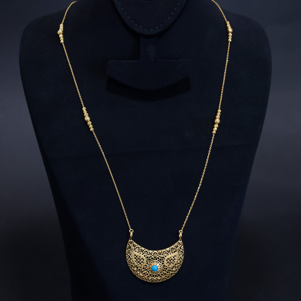 21K gold necklace with intricate filigree work and a blue stone pendant – Main View