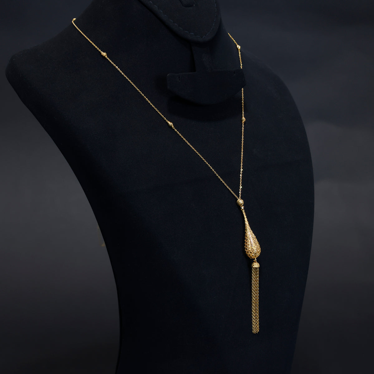 21K gold long necklace with a sleek teardrop tassel – Side Angle