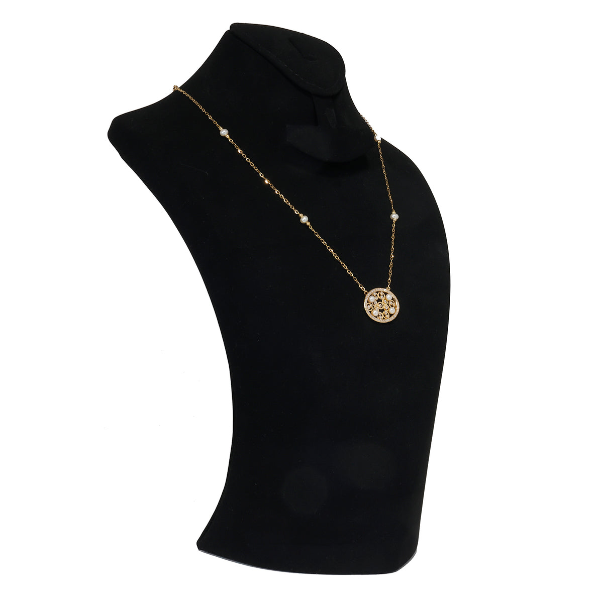 Gold necklace with a pendant on a black mannequin bust against a white background