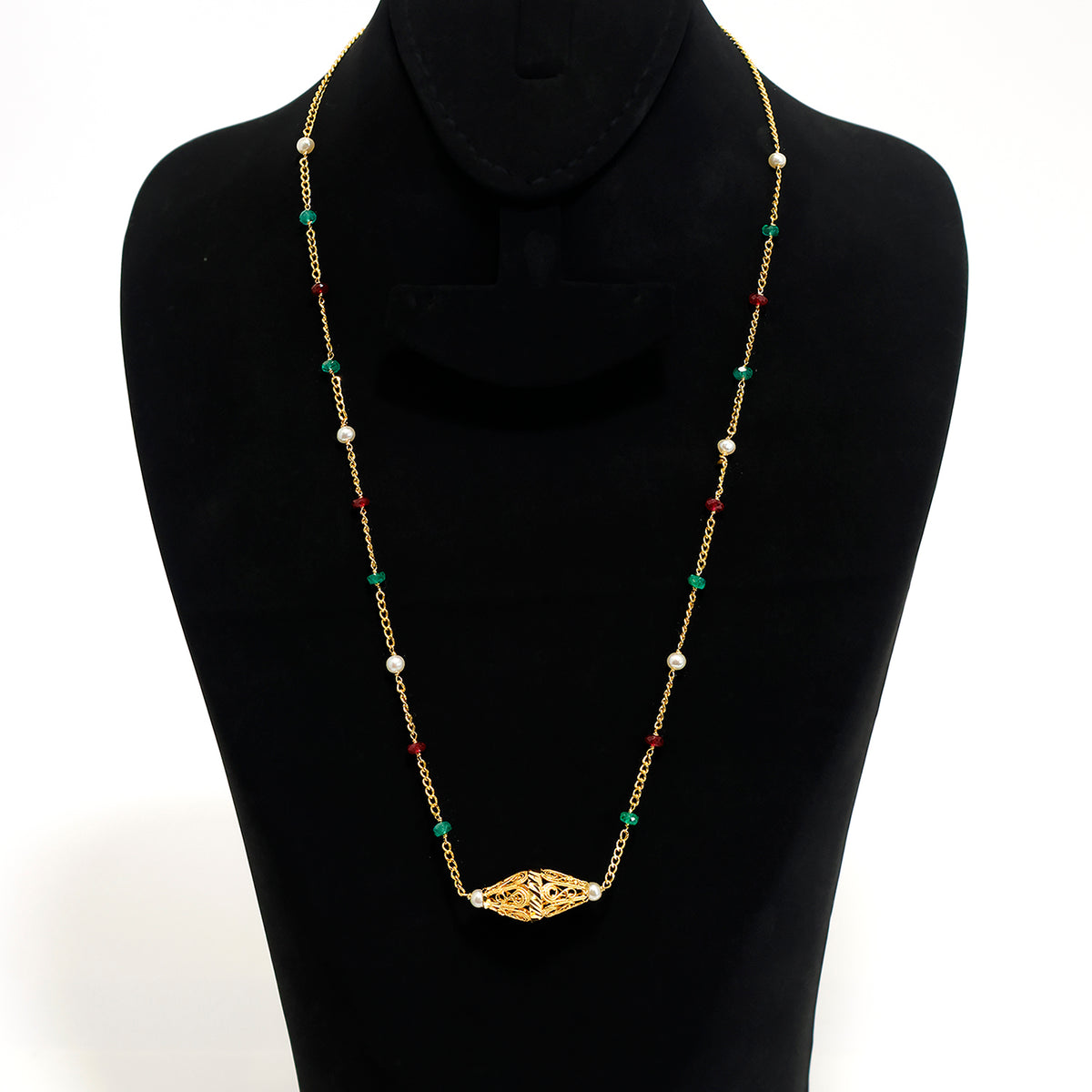 Necklace with gold chain and colorful beads on a black mannequin