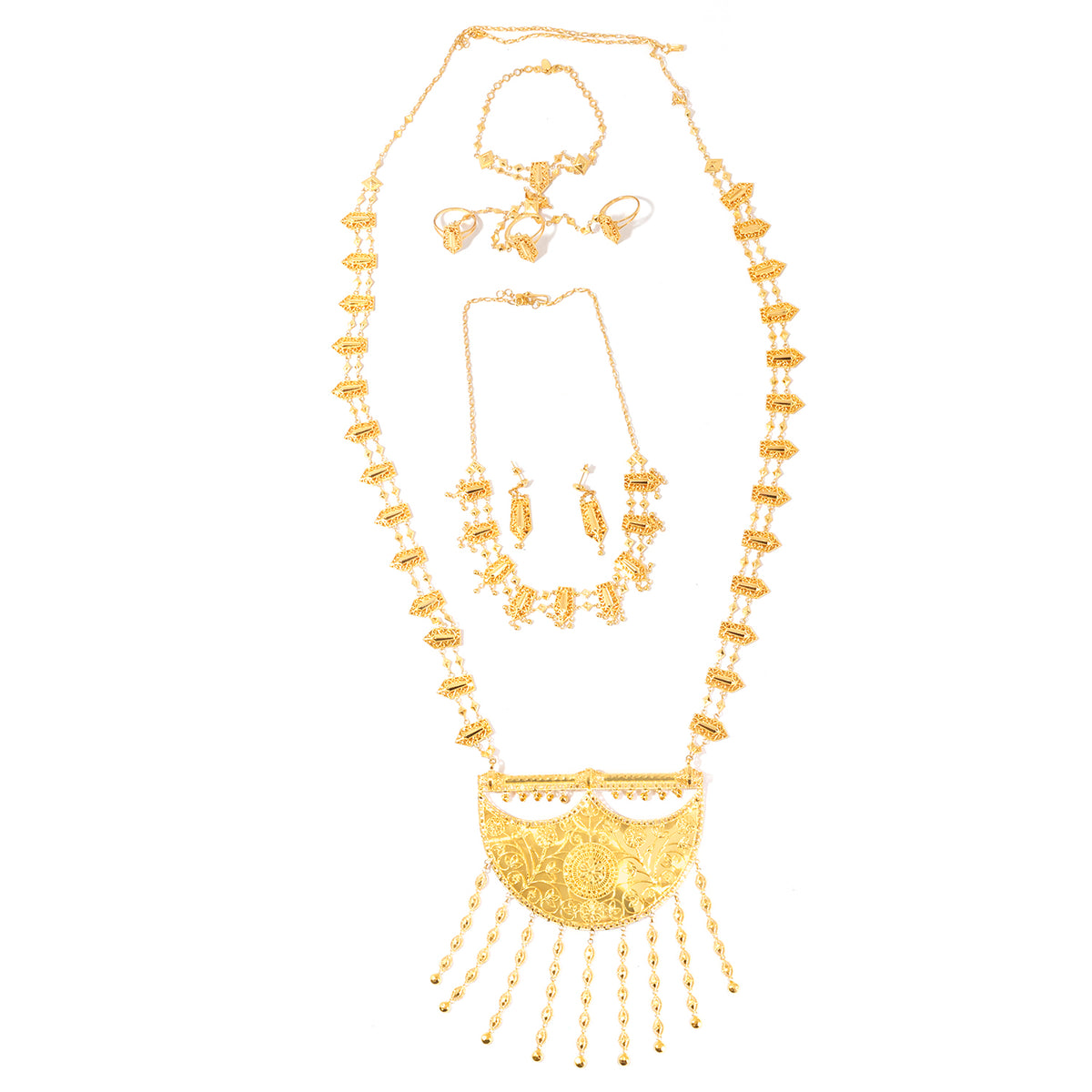 Gold jewelry set featuring a long statement necklace with a large semi-circular pendant and dangling beads, accompanied by a matching bracelet, earrings, and ring on a plain white background.
