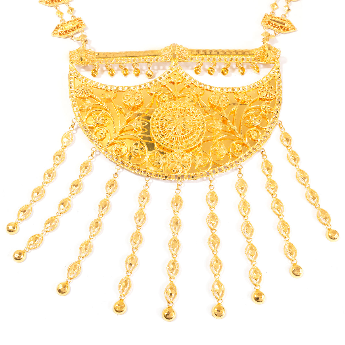 Gold-toned ornate necklace with a large semi-circular filigree pendant, intricate floral detailing, and multiple dangling chain fringes on a plain white background.