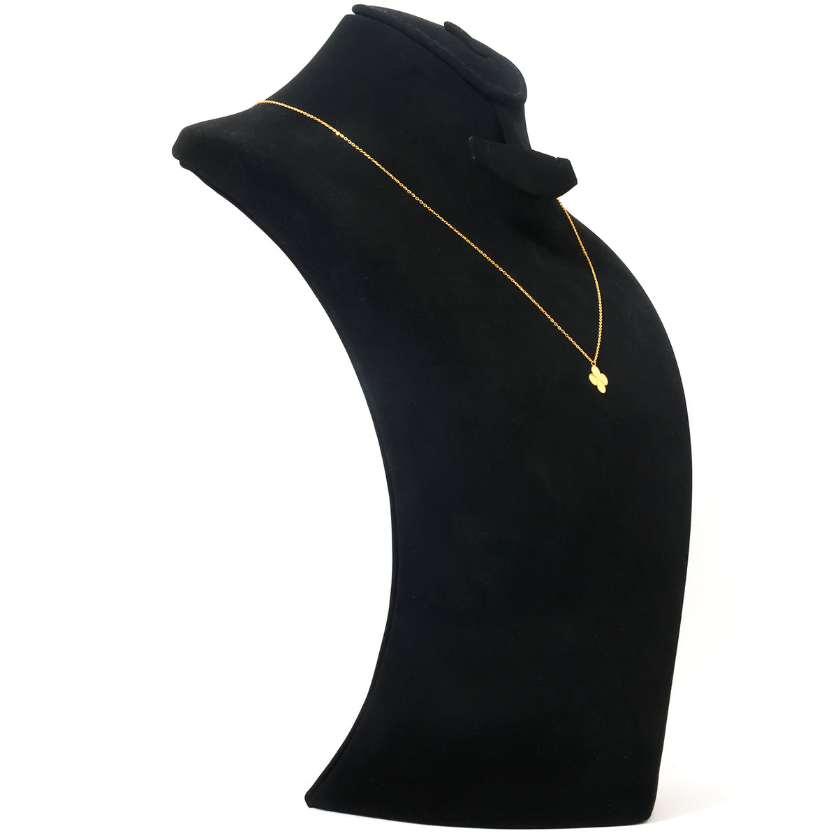A delicate gold chain necklace with a small gold heart-shaped pendant, displayed on a black velvet jewelry bust against a white background.