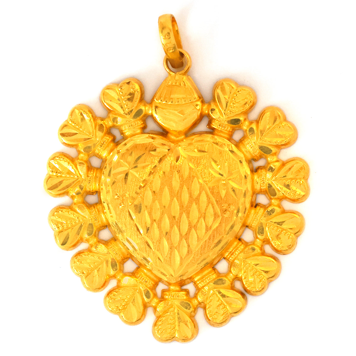 Gold heart-shaped pendant with intricate designs on a white background