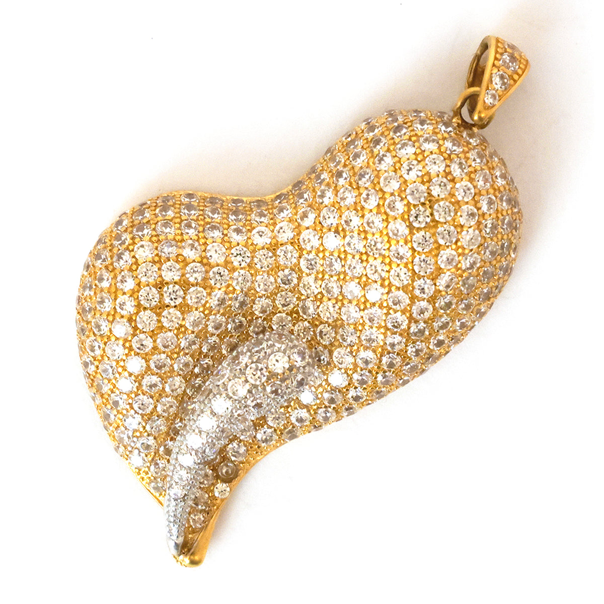 Gold and silver heart-shaped pendant on a white background