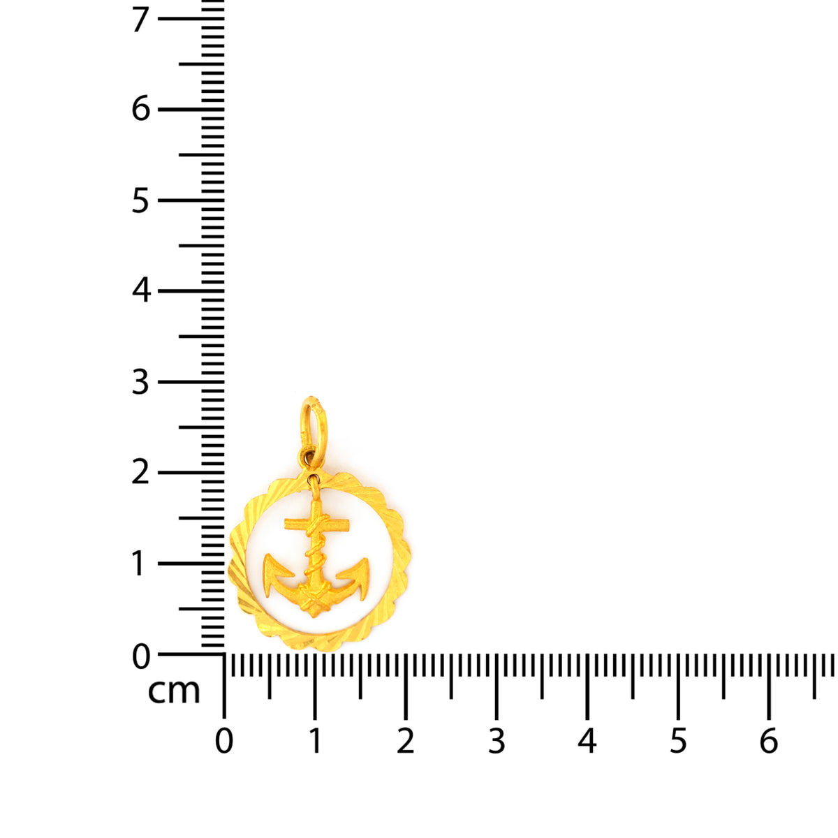 Gold anchor pendant with a ruler for scale on a white background