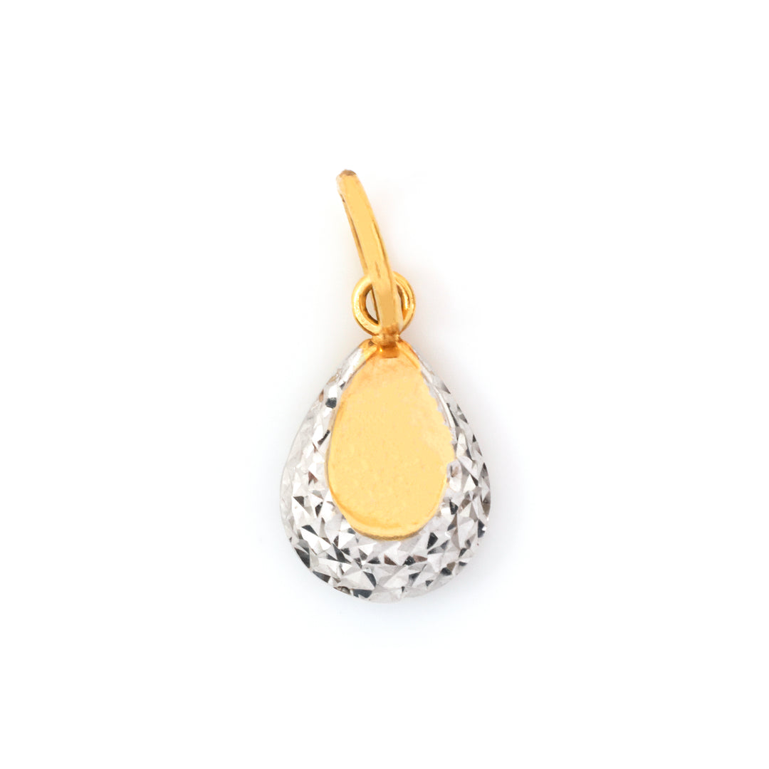 A teardrop-shaped pendant charm featuring a textured silver outer body and a smooth gold center, suspended from a gold bail, shown on a plain white background.