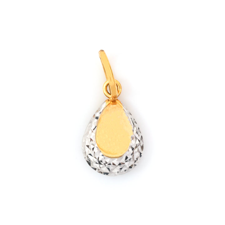 A teardrop-shaped pendant charm featuring a textured silver outer body and a smooth gold center, suspended from a gold bail, shown on a plain white background.