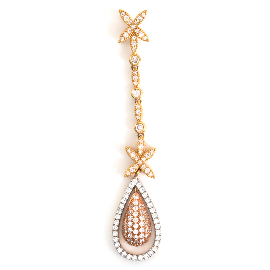 A long, elegant drop earring in yellow gold and rose gold, embellished with clear pavé diamonds. The earring features a teardrop-shaped drop with a rose gold center surrounded by a diamond halo, connected by a chain of gold and diamond links to two starfish-shaped ends.