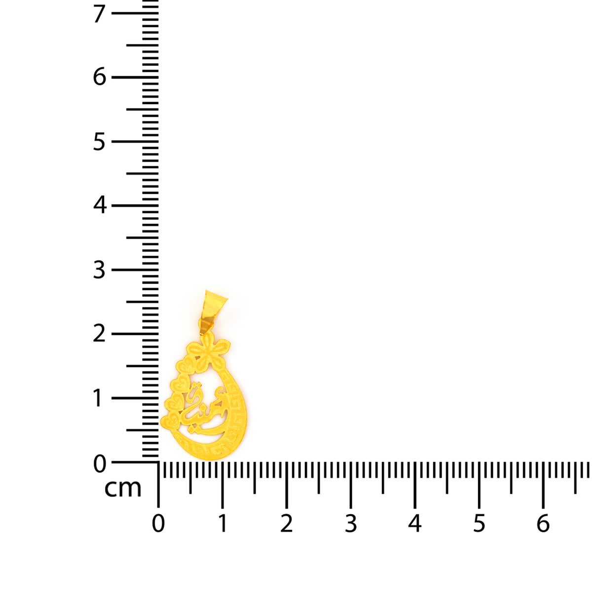 ذهب معلقة next إلى ruler on white background
