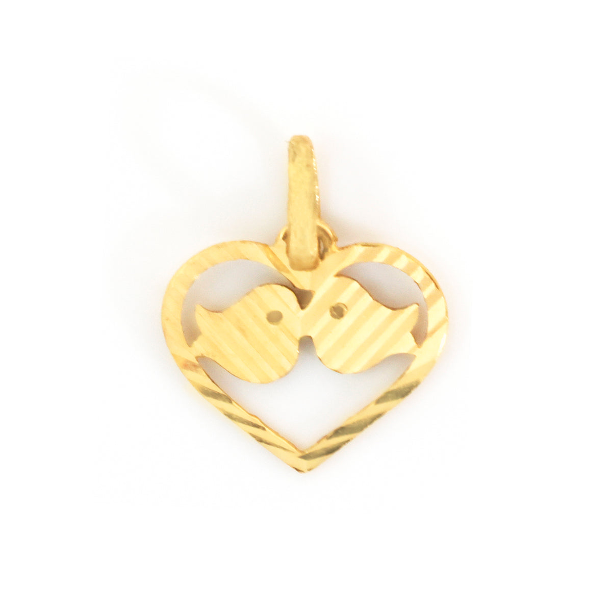 A gold heart-shaped pendant featuring two kissing birds, with one bird cut out to show the other inside, on a plain white background.