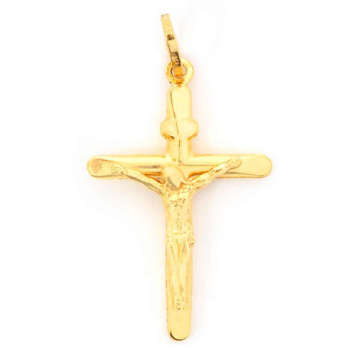 Gold crucifix pendant on a white background