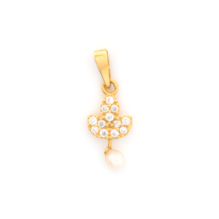 A gold pendant shaped like a stylized lotus or flame, adorned with small clear stones and a dangling white pearl, shown on a plain white background.