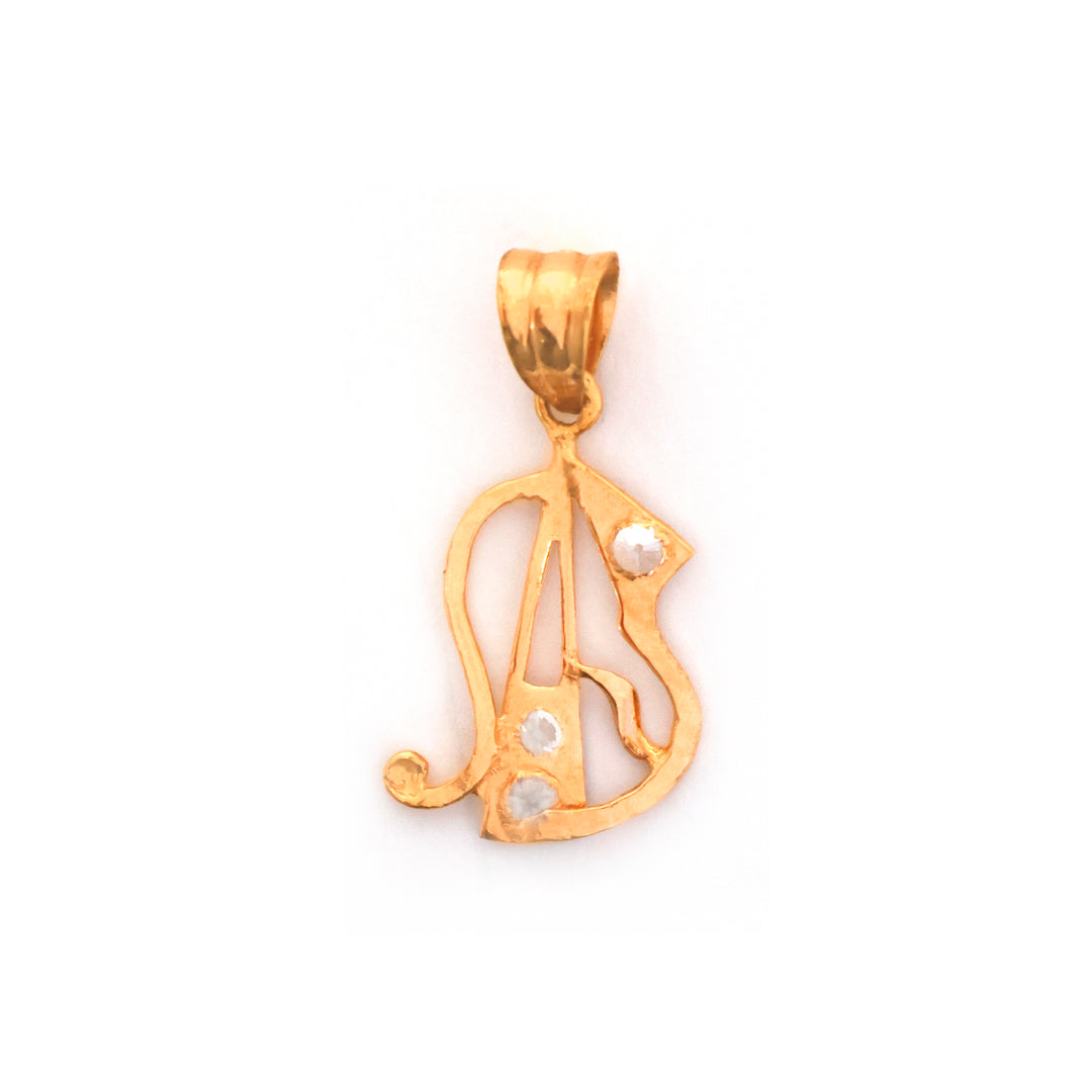 Gold pendant with a unique design on a white background