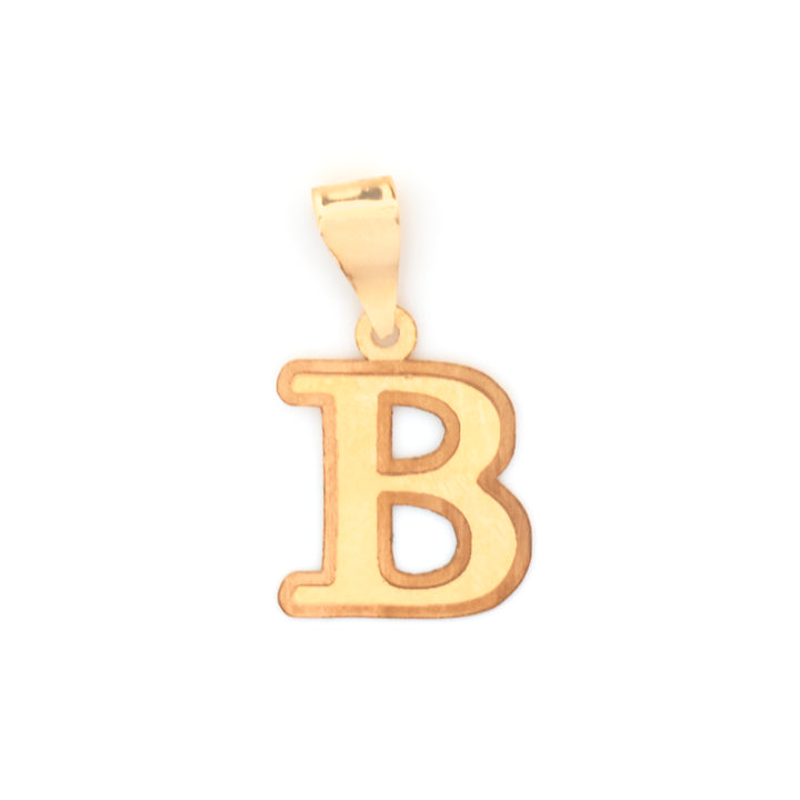 A gold initial pendant charm shaped like the letter &