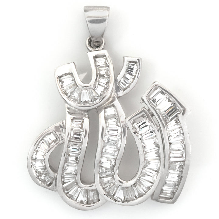 A silver-tone pendant featuring the Arabic calligraphy for &