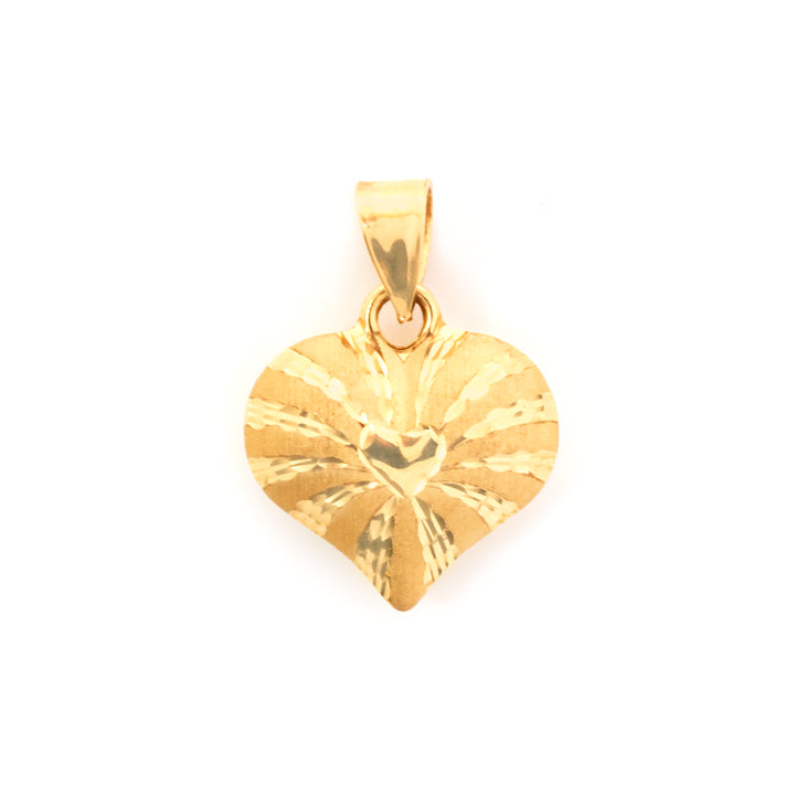 Gold heart-shaped pendant on a white background