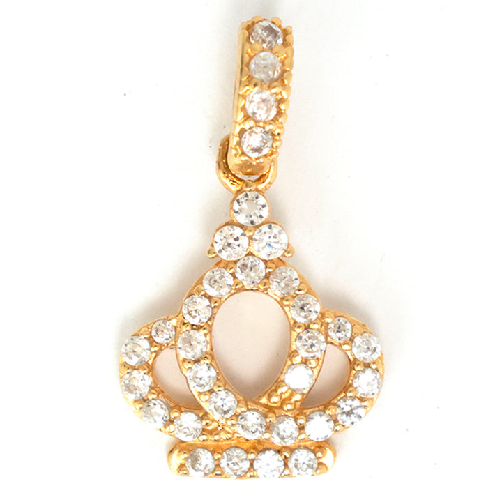 Gold pendant with clear stones on a white background