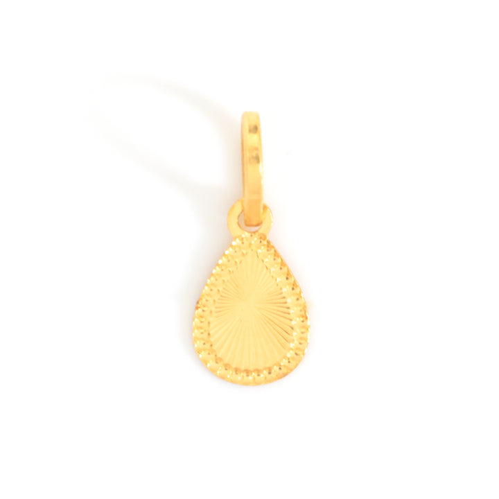 A gold teardrop-shaped pendant charm with a textured sunburst pattern and a beaded border, shown on a plain white background.