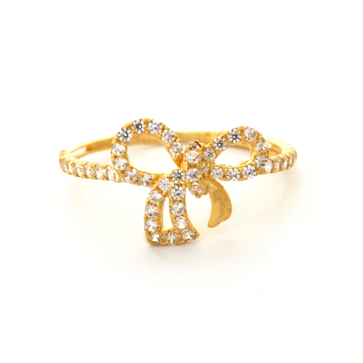 Gold ring with diamond accents on a white background