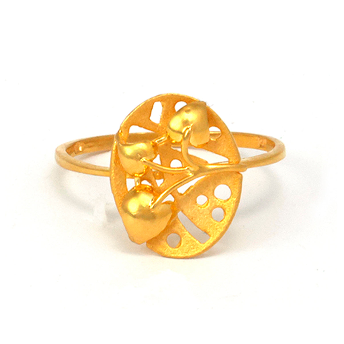 Gold ring with a leaf design on a white background