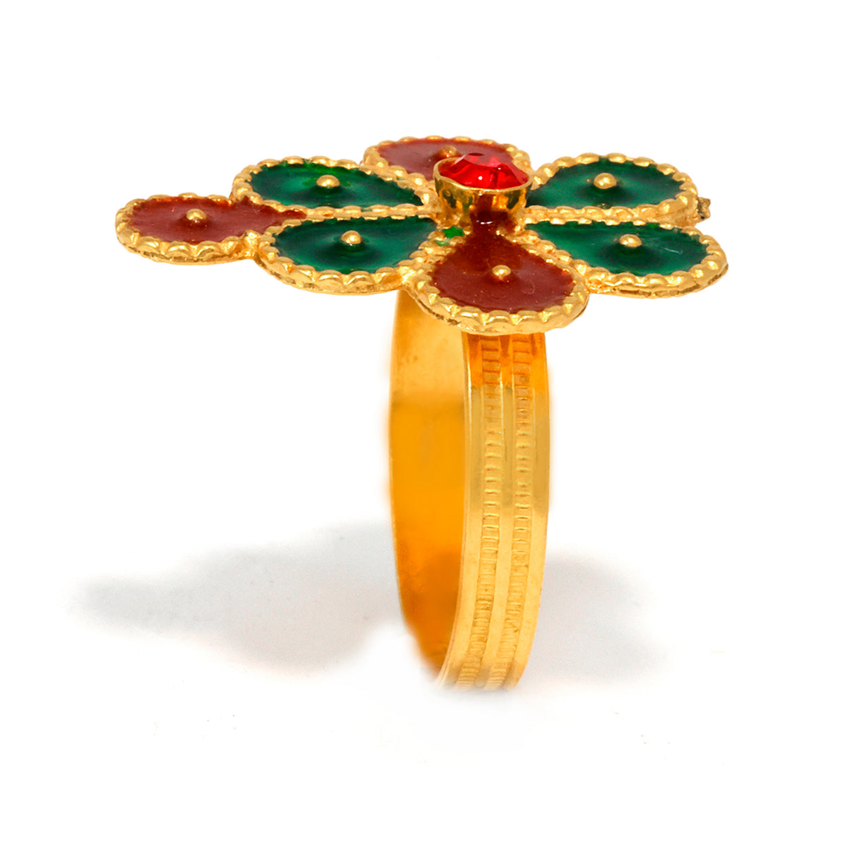 Gold ring with green and red gemstones on a white background