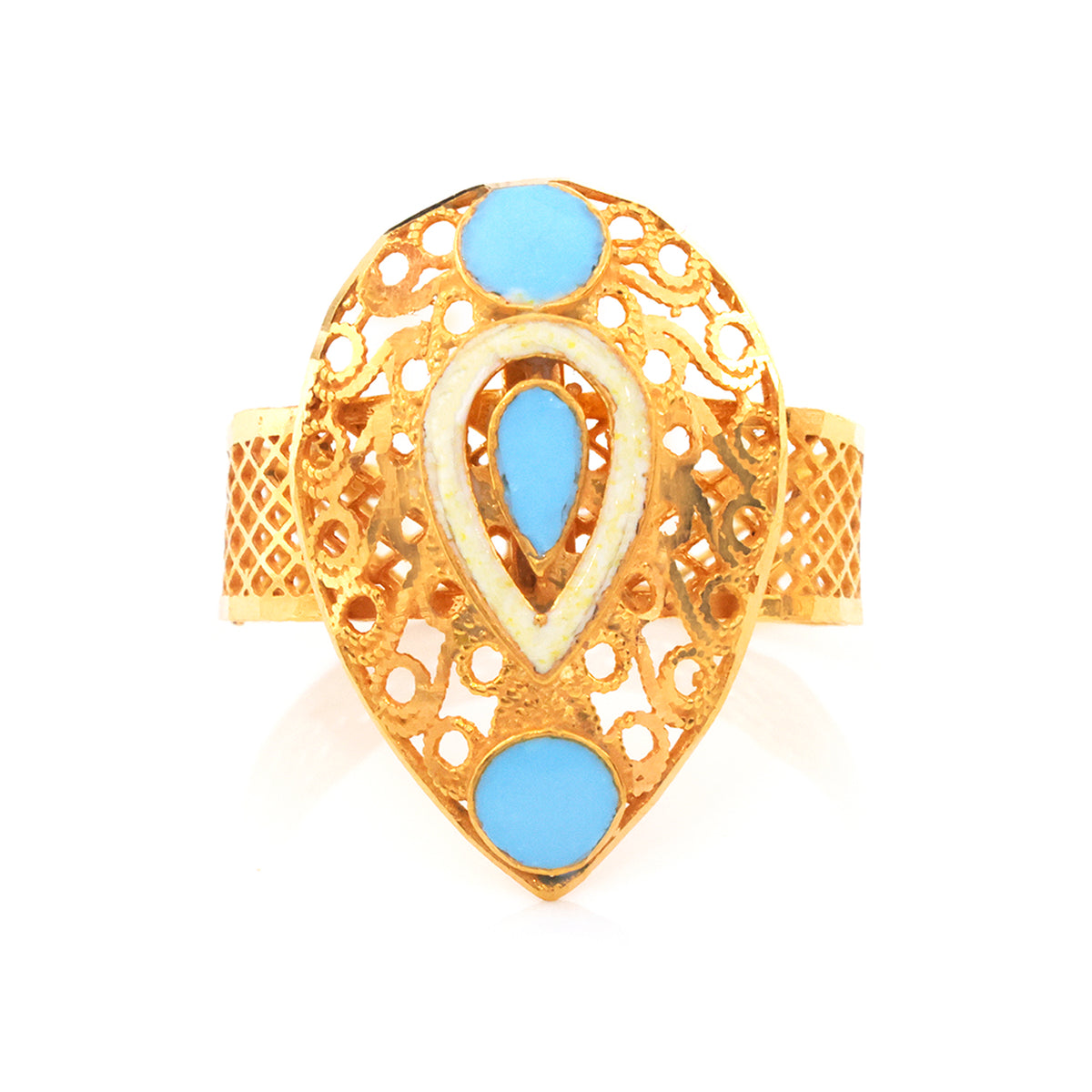 A gold filigree ring with three light blue stone accents, set against a plain white background.
