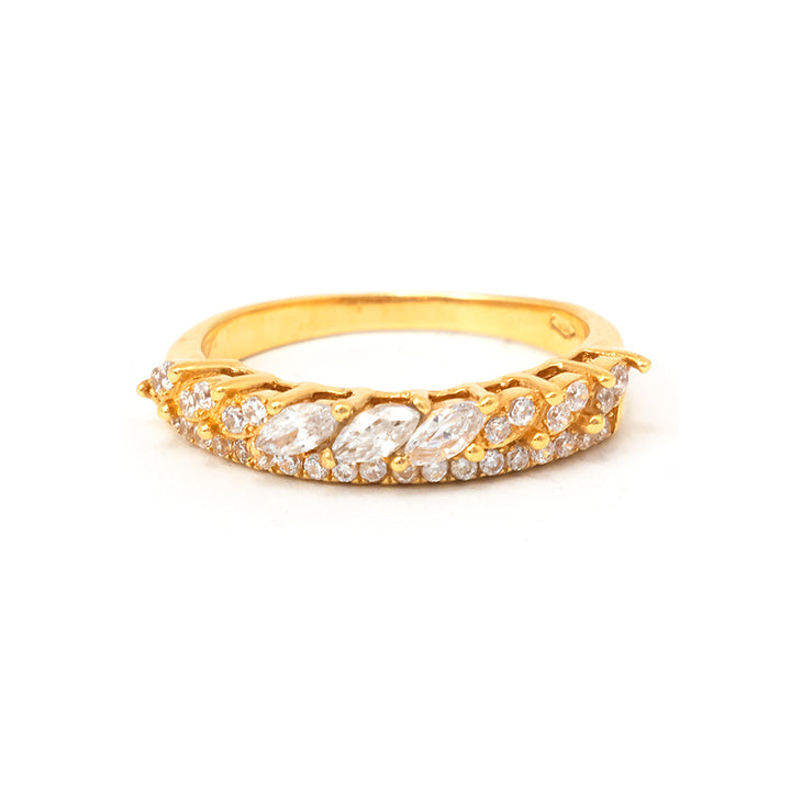 Gold ring with marquise-shaped diamonds on a white background
