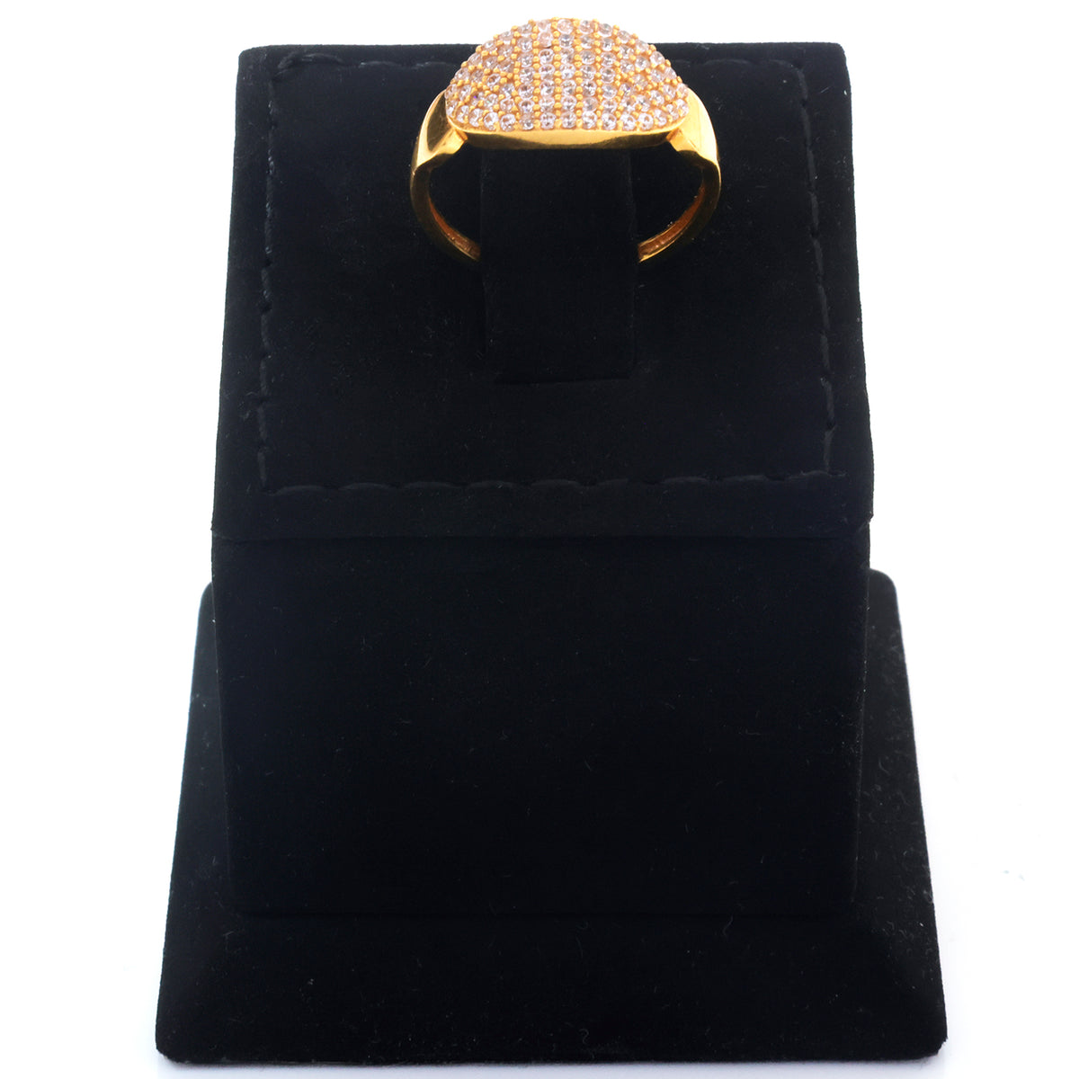 A gold ring with a dome-shaped pavé setting, displayed on a black velvet jewelry stand against a white background.