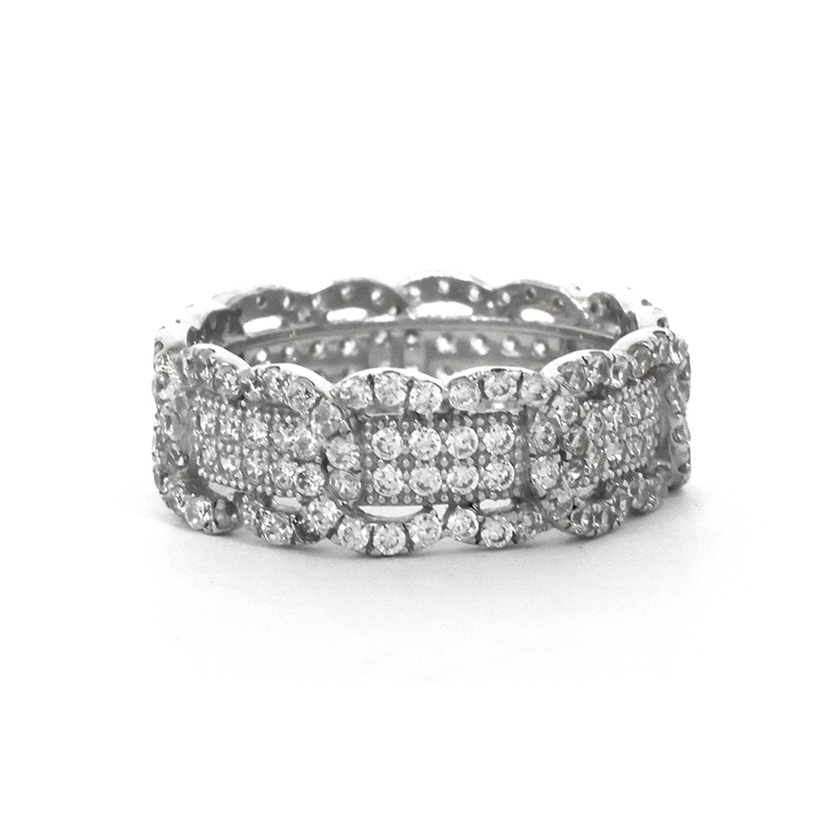 Silver ring with diamond accents on a white background