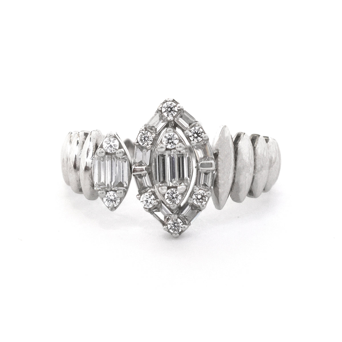 Silver earring with diamond accents on a white background