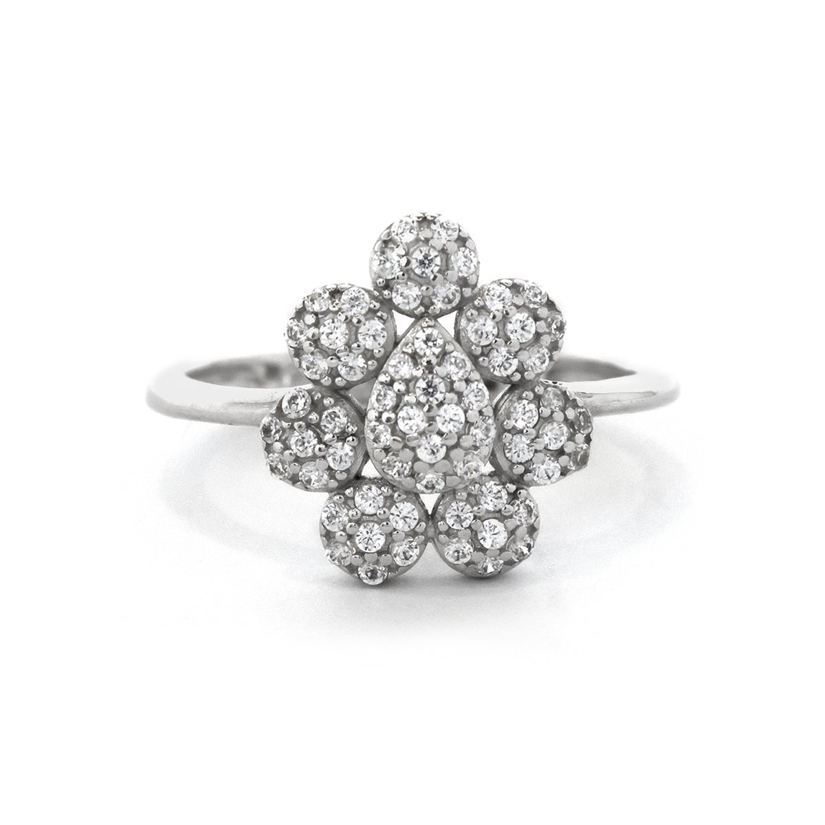 Silver ring with diamond-like stones on a white background