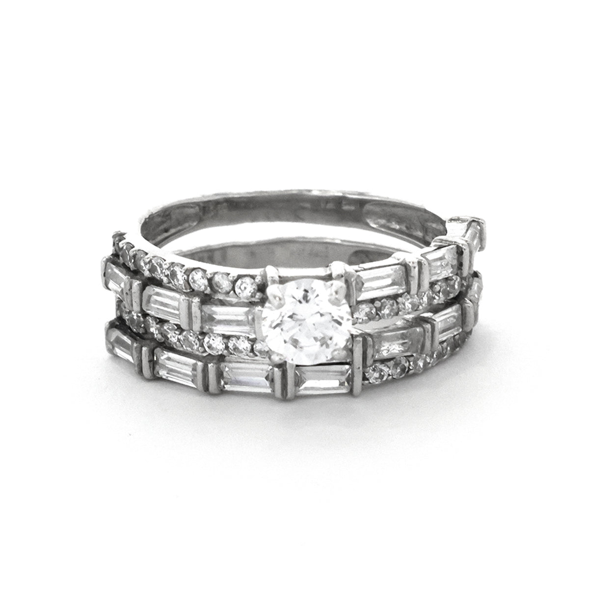 Stack of diamond rings on a white background