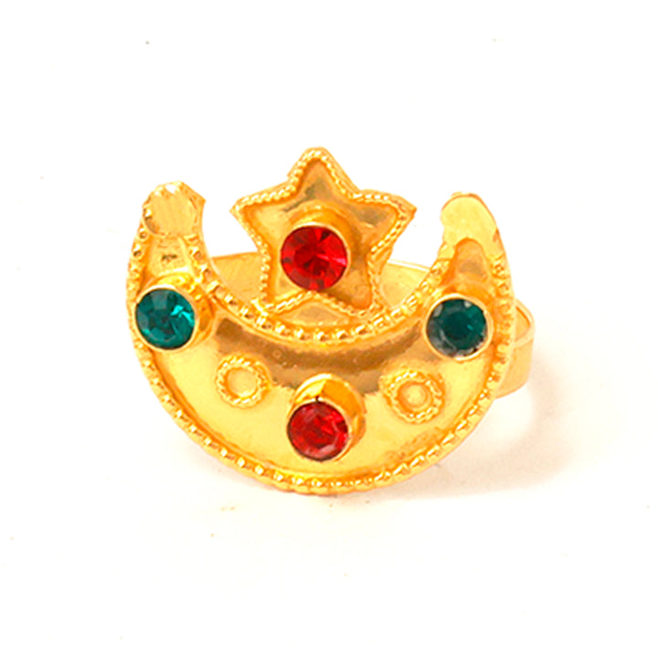 Gold ring with star and moon design and red and green gemstones on a white background