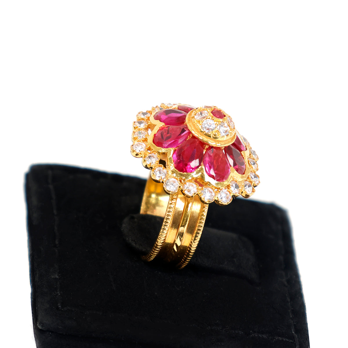 Gold ring with red gemstones and diamonds on a black velvet stand - zero making charge 