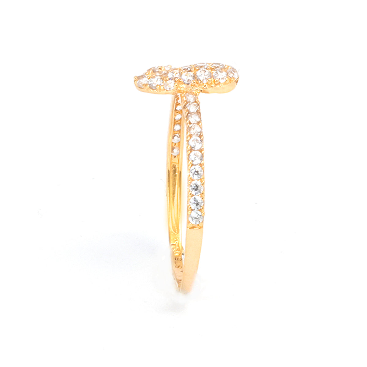 Gold ring with diamond accents on a white background